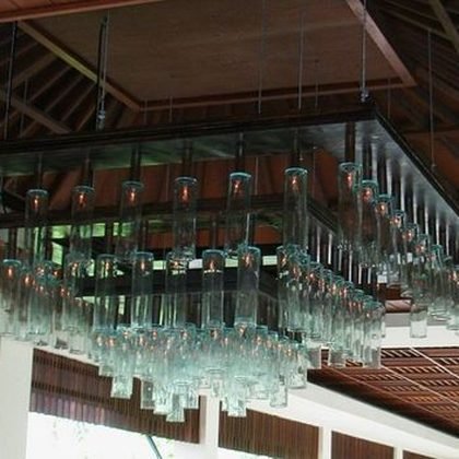Suspended glass chandelier under a timber ceiling, Vimala Resort, Bali